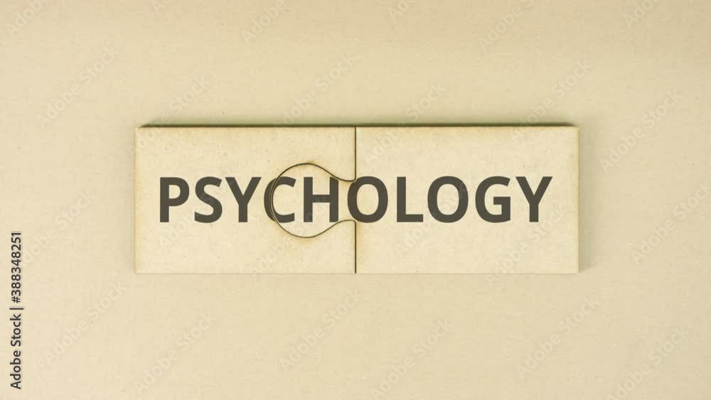 PSYCHOLOGY text on cardboard jigsaw puzzle pieces PSYCHOLOGY text on cardboard jigsaw puzzle pieces