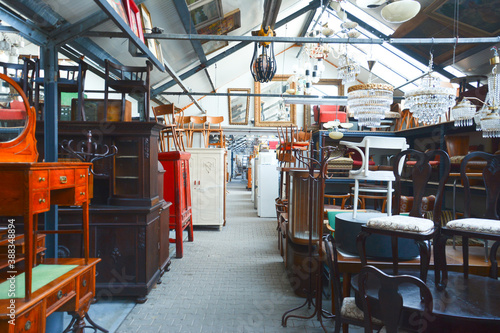 Vintage furniture shop. Second hand furniture market. Retro furniture for sale. Antique vintage store. 