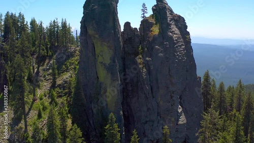 Bessie Rock in the southern Oregon Cascades, A volcanic feature, viewed with an aerial perspective showing the beautiful landscape and peaks in the background photo