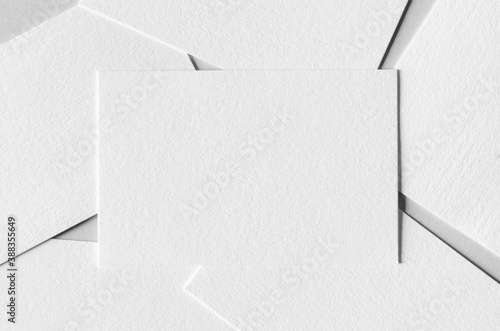 Textured business card mockup on a grey background.  85x55 mm. photo