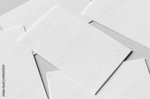 Textured business card mockup on a grey background.  85x55 mm. photo