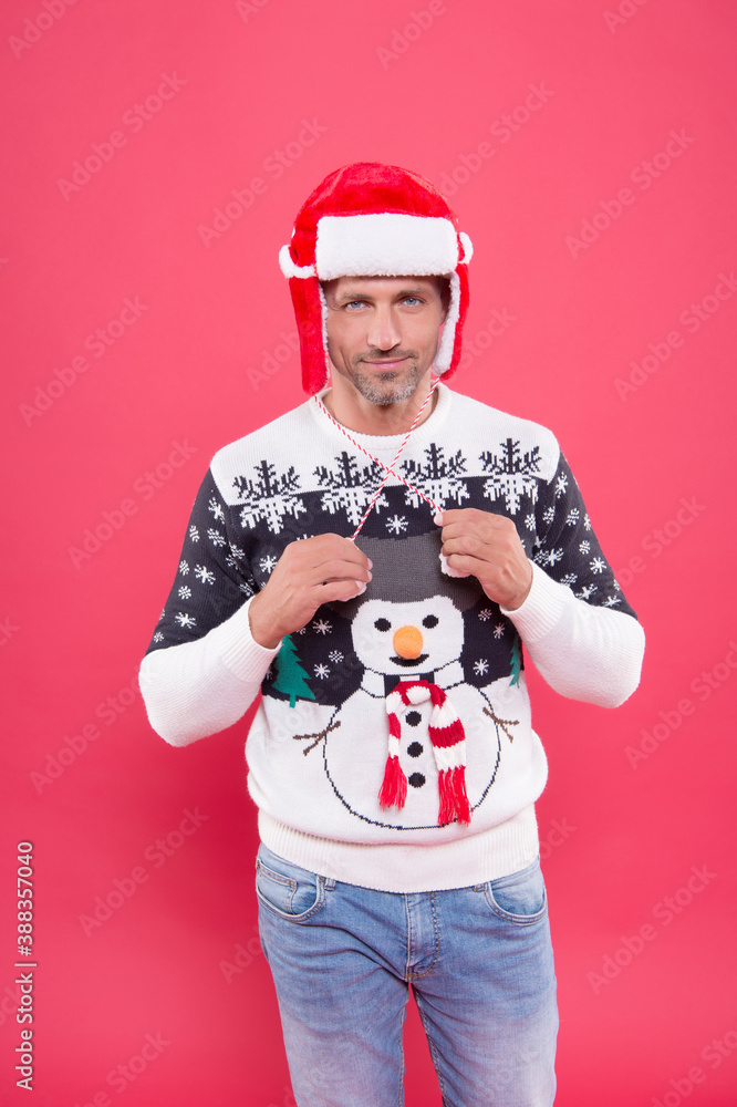 man in sweater and hat wish happy new year and merry christmas holiday ready to celebrate party with fun and joy full of xmas presents, winter vacation time