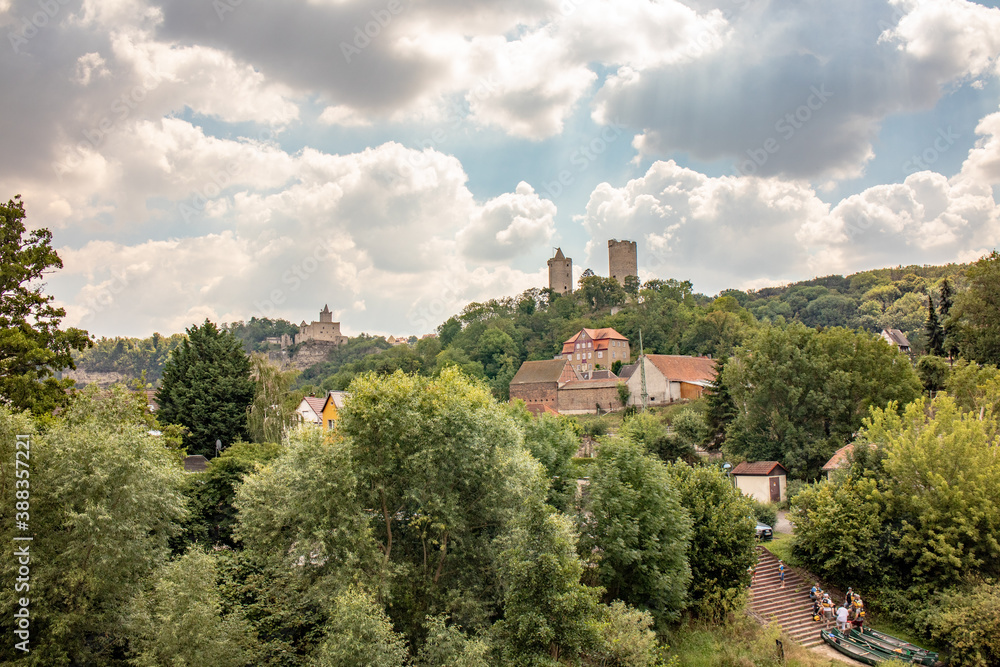 Panorama of the castle ruins Rudelsburg and Saaleck in the landscape and tourist area Saale valley on the river Saale near the world cultural heritage city of Naumburg, Saxony Anhalt, Germany