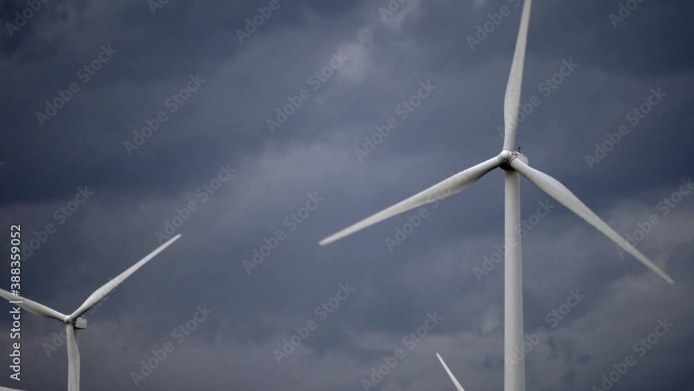 The energy of the future. Raw power and energy. Wind farm turbine in motion. Generating clean power from wind. The future. Shot in 4k. The energy of the future. Raw power and energy. Wind farm turbine in motion. Generating clean power from wind. The future. Shot in 4k.