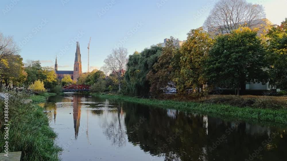 Gorgeous view on town street with cathedral on background in autumn day. Tourism, travel concept. Europe, Sweden, Uppsala. Gorgeous view on town street with cathedral on background in autumn day. Tourism, travel concept. Europe, Sweden, Uppsala.