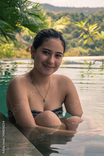 woman relaxing in the pool photo