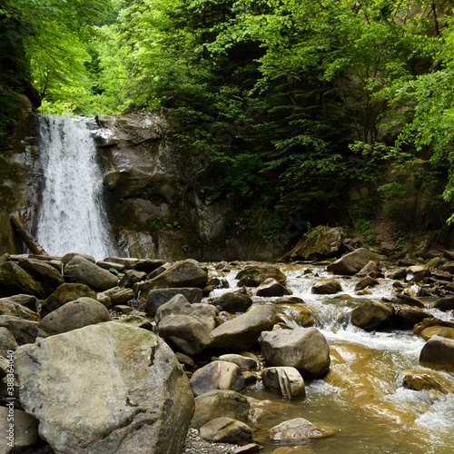 Pruncea waterfall on the Casoca river in the Buzau mountains, Romania. A beautiful cascade in the forest photo