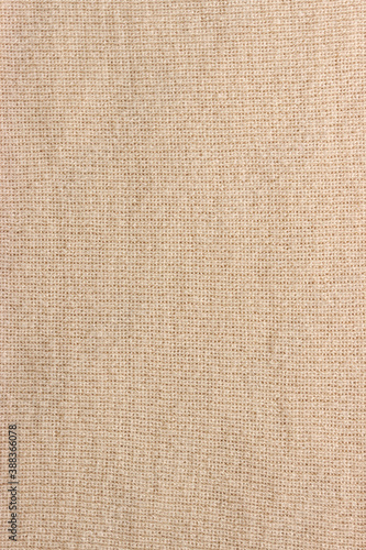 Light brown wool fabric texture. Abstract textile background.
