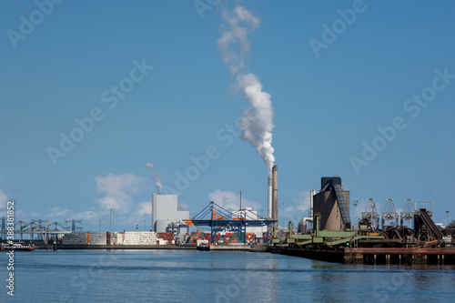 Harbor with large cranes and containers in Rotterdam, Holland