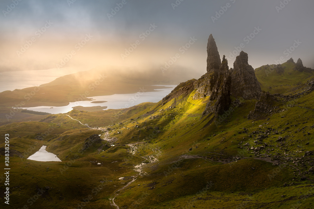 Dark and moody low clouds over the iconic Old Man of Storr on the Isle of Skye, Scotland, UK. 
