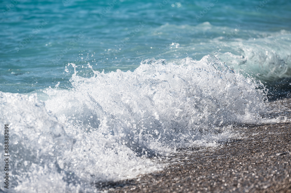 Fototapeta premium Blue sea wave with splashes