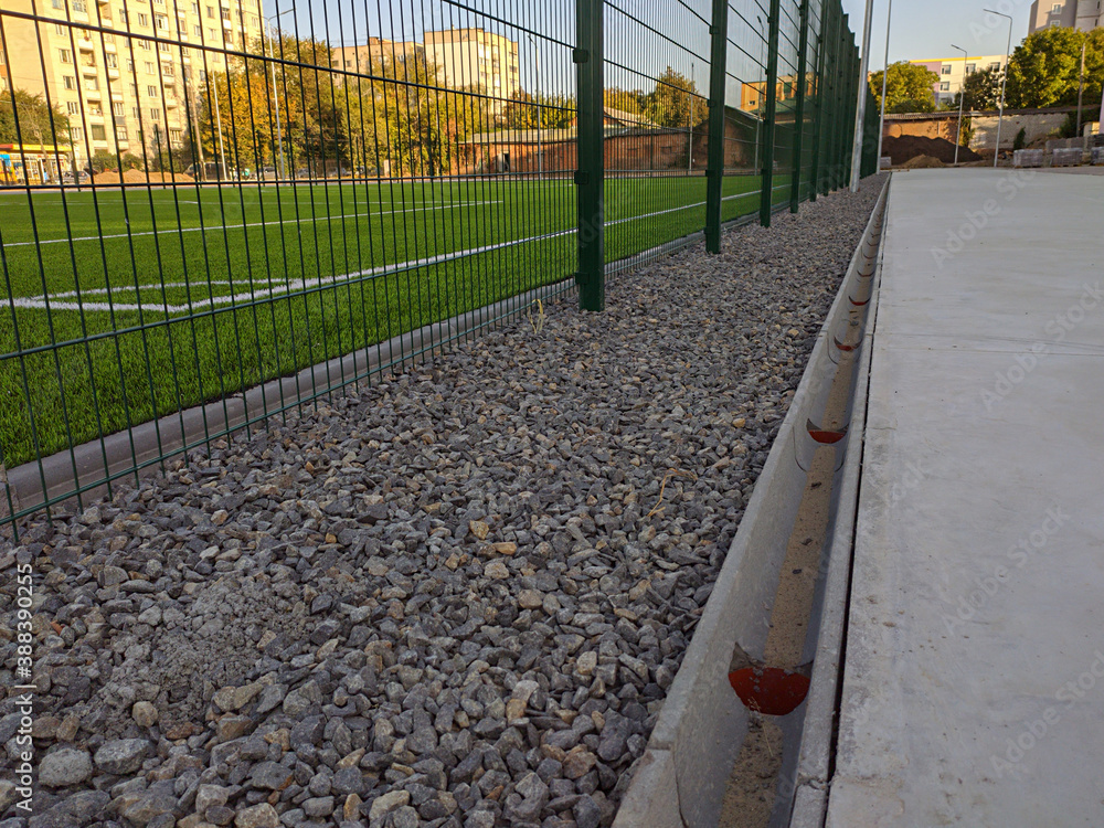 drainage of a football field with an artificial covering grass