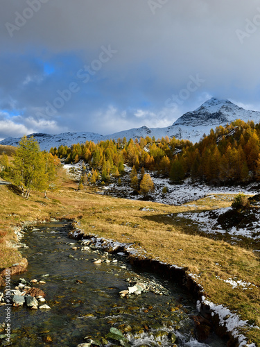 Campagneda creek at the foot of Pizzo Scalino Mountain, dressed by autumn colors