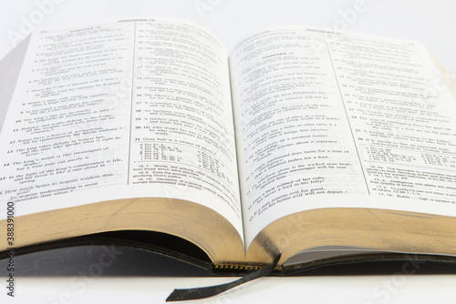open bible on white background