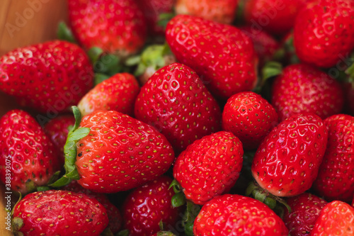 background with delicious and juicy red strawberries