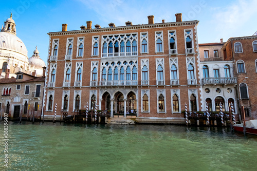 Beautiful Palace in Grand Canal on a Bright Cleer Day - Quiet Morning in Venice, Veneto, Italy. photo