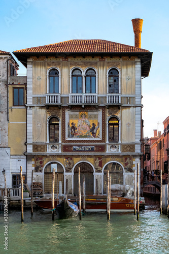 Beautiful Palace in Grand Canal on a Bright Cleer Day - Quiet Morning in Venice, Veneto, Italy. photo