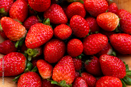 background with delicious and juicy red strawberries