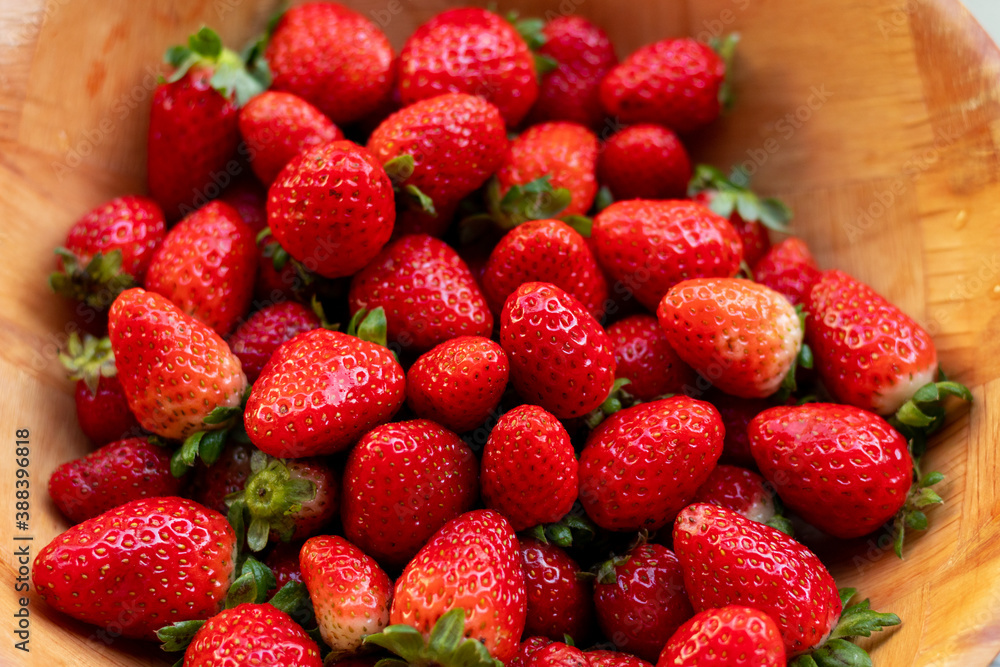 background with delicious and juicy red strawberries background with delicious and juicy red strawberries