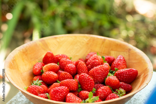 background with delicious and juicy red strawberries