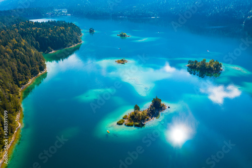 Aerial view of Eibsee lake  little islands in turquoise water