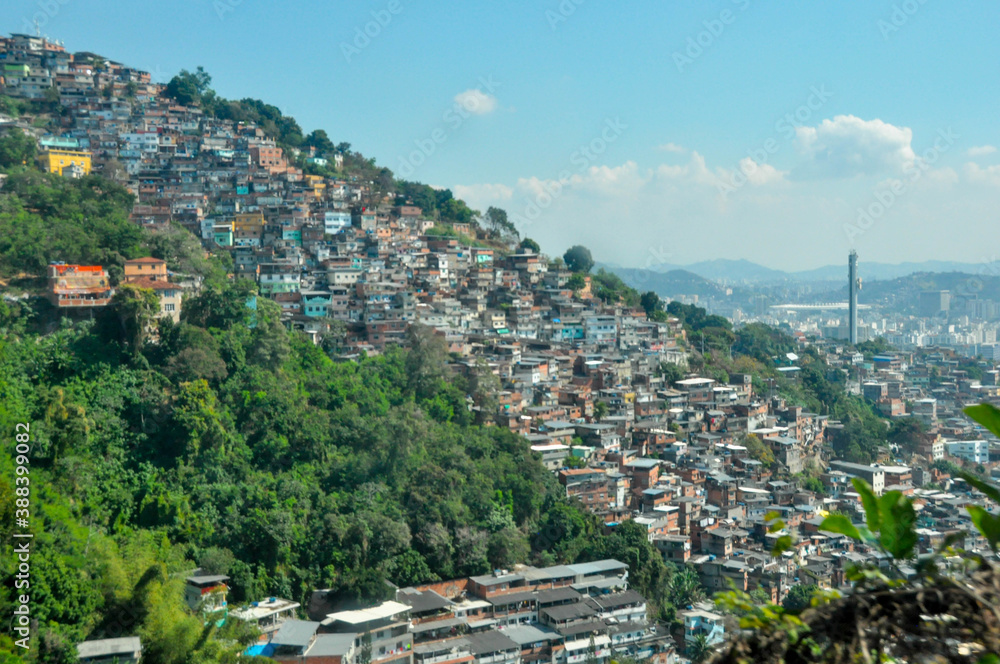 A neighborhood builded all around a mountain in Rio de Janeiro, Brasil.