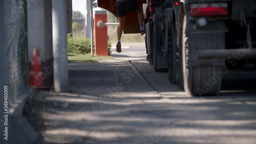 Wallpaper Mural A Tarmac Factory Worker Is Leaving His Truck And Closing The Door  Torontodigital.ca