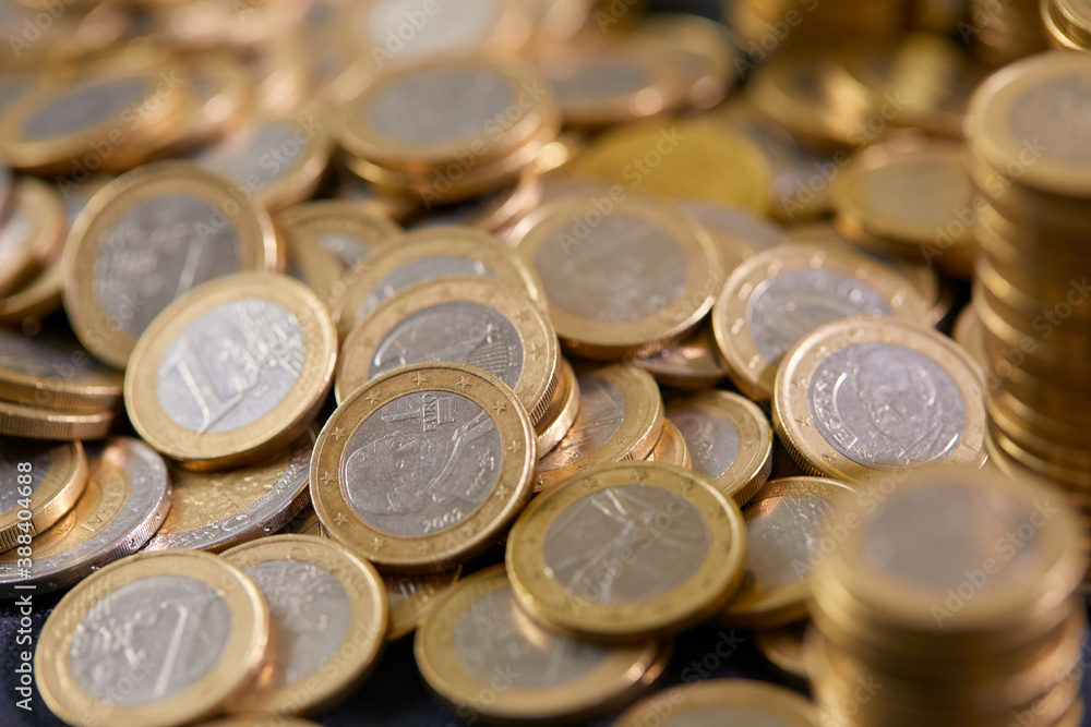 Stock Photo - Euro coins. Euro money. Euro currency.Coins stacked on each other in different positions. Money concept Stock Photo - Euro coins. Euro money. Euro currency.Coins stacked on each other in different positions. Money concept