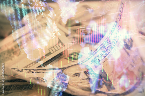 Double exposure of forex graph drawing over us dollars bill background. Concept of financial markets. © peshkova