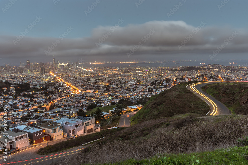 view of the city from a mountain during dusk