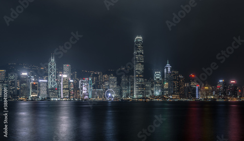 Hong Kong Harbourfront Cityscape Skyling in the Night Time with Vibrant Buildings and Skyscrapers © Ernest