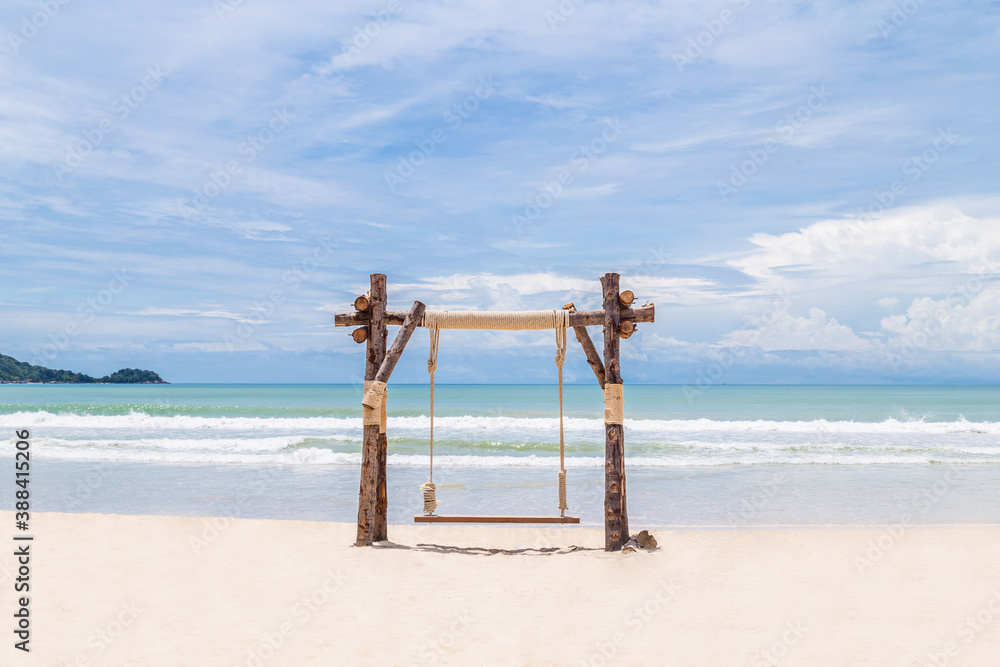 Exotic Tropical Paradise Swings over Crystal Clear Turquoise Blue Ocean Sea. Exotic Tropical Paradise Swings over Crystal Clear Turquoise Blue Ocean Sea.