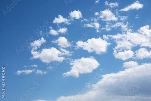 Blue sky and white clouds in the sunny sky background material © zhenya