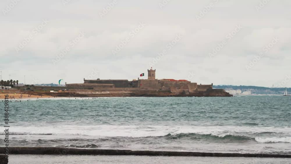 Beautiful Carcavelos Beach and the São Julião da Barra fortress in Portugal Beautiful Carcavelos Beach and the São Julião da Barra fortress in Portugal