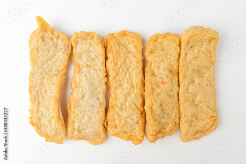 Foto Thin fish cake on white background