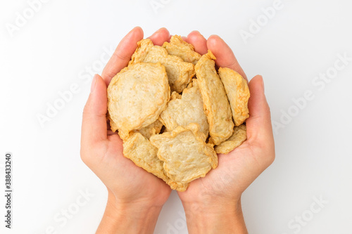 Tableau sur toile Thin fish cake on white background
