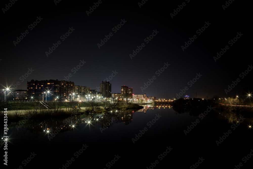 Night. River embankment. Night city. The city lights at night. Kurgan. Tobol river.