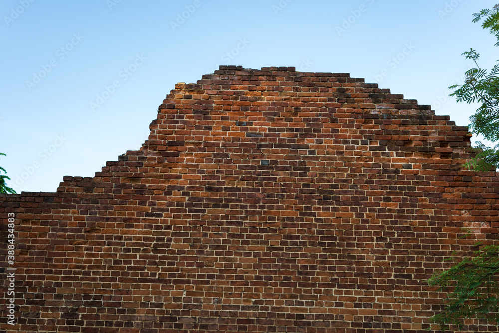Neat brick wall of old brick