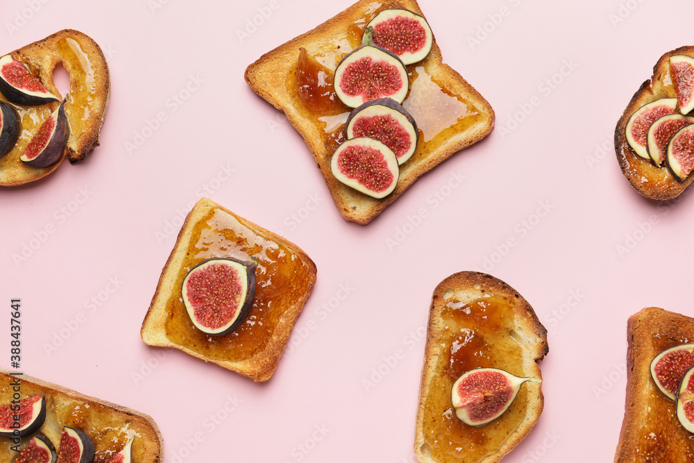 Tasty sandwiches with sweet fig jam on color background Tasty sandwiches with sweet fig jam on color background