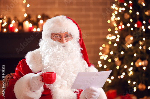 Santa Claus reading letter ...