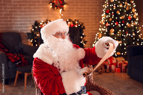 Santa Claus reading letter ...