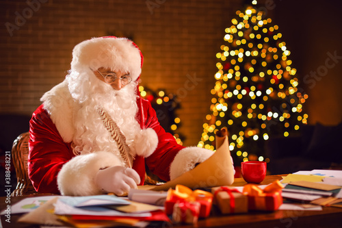 Santa Claus writing letter ...