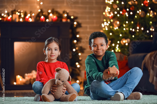 Cute children with toys at ...