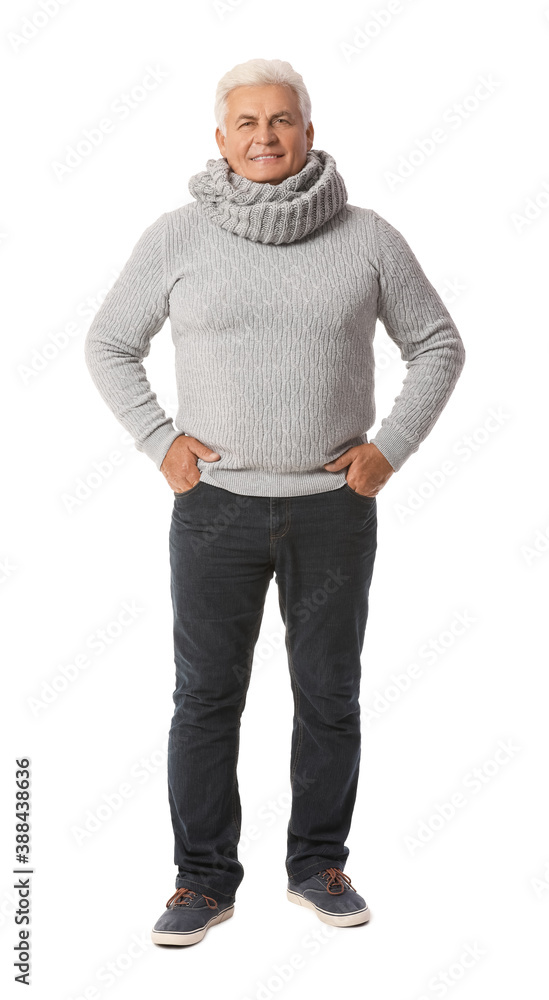 Fototapeta premium Mature man in winter clothes on white background