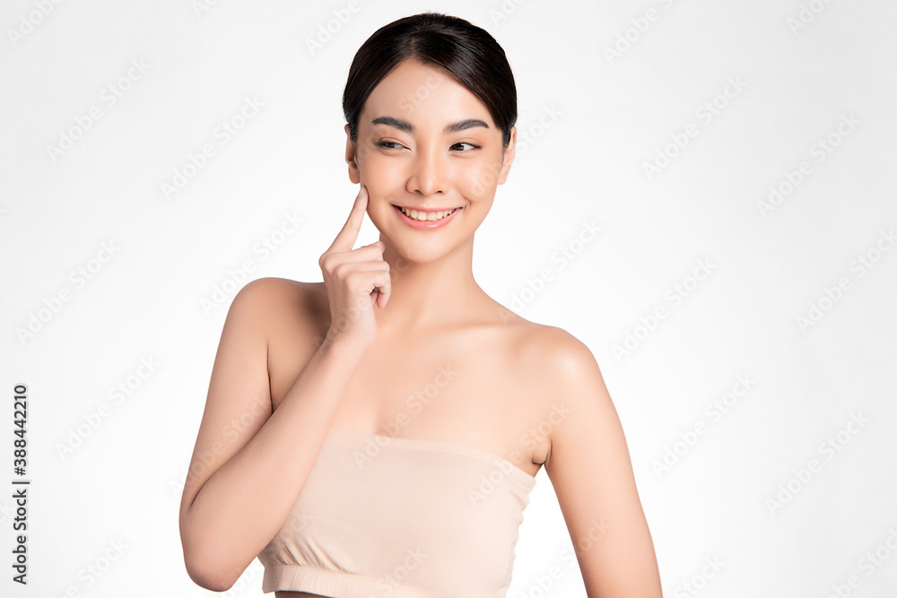 Beautiful young asian woman with clean fresh skin on white background, Face care, Facial treatment, Cosmetology, beauty and spa, Asian women portrait Beautiful young asian woman with clean fresh skin on white background, Face care, Facial treatment, Cosmetology, beauty and spa, Asian women portrait