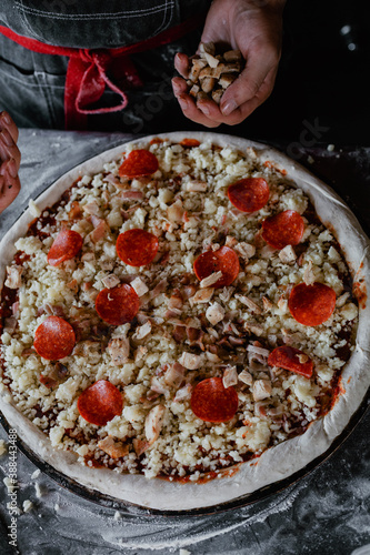 pizza with mushrooms, tomatoes, and pepperoni 