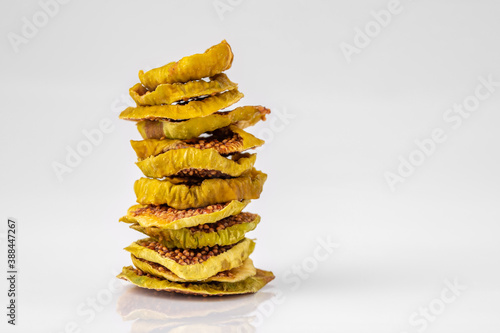 slices of dried figs on a white background. dried fruits. eco. macro.