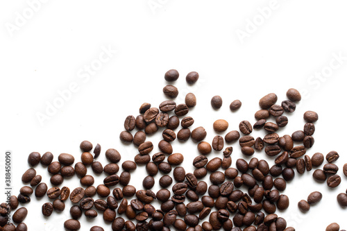 Top view of fresh roasted Coffee beans. Isolated on a white background.