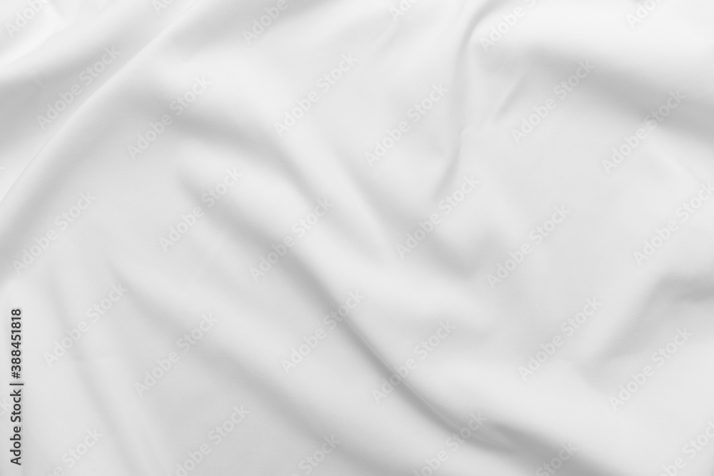 Abstract white fabric texture background. Cloth soft wave. Creases of satin. silk and cotton.	