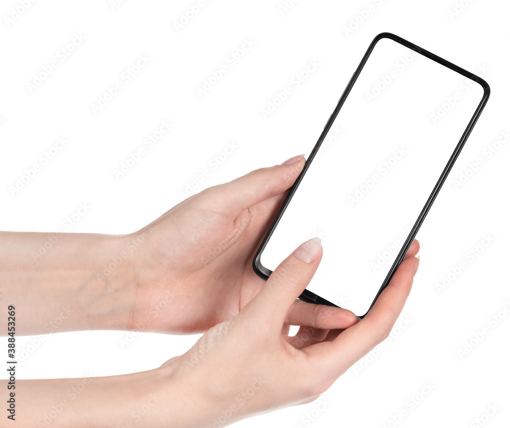 Woman hand holding the black new smartphone with blank screen isolated white background. hands using phone clipping path Woman hand holding the black new smartphone with blank screen isolated white background. hands using phone clipping path